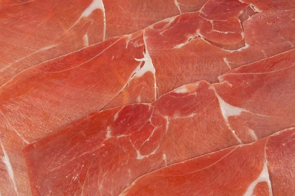 Röd skinka prosciutto skivad — Stockfoto