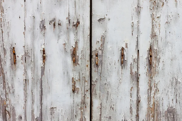 Vieja puerta cerrada con llave de madera y gruñón — Foto de Stock