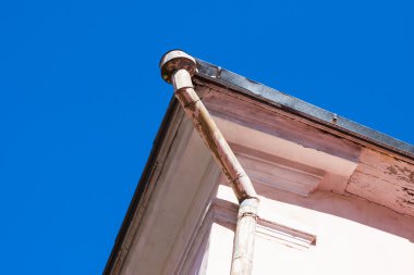 Rain gutters on old home clipart