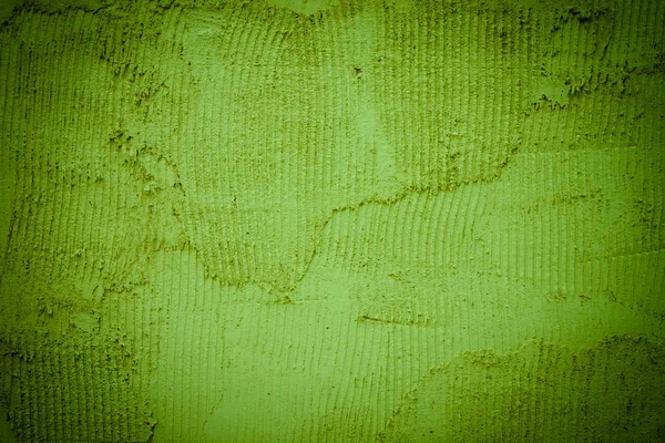 Textura de fundo de uma parede verde — Fotografia de Stock