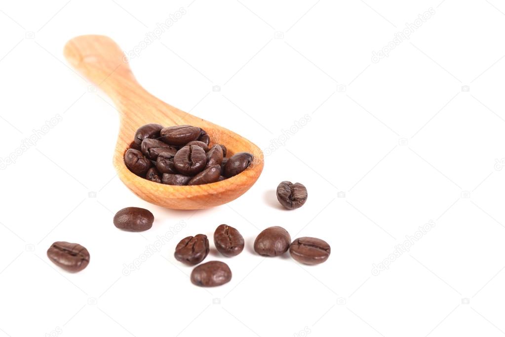 Coffee beans and wood spoon