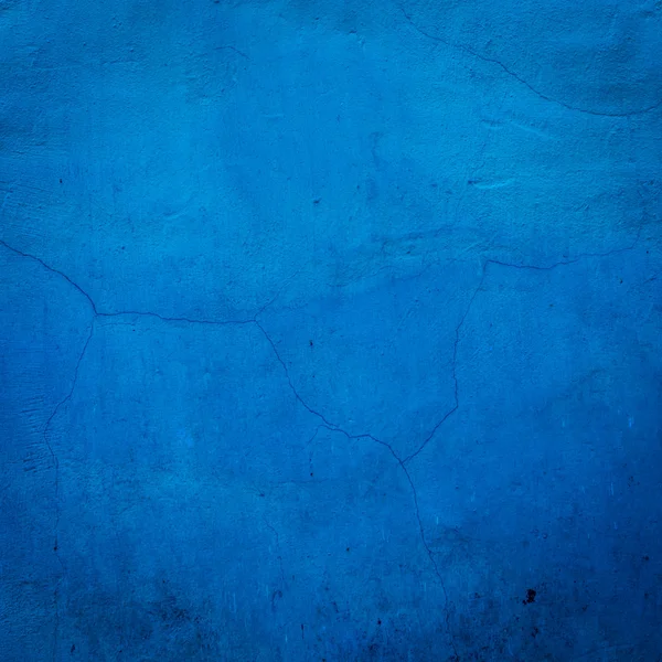 Blue cracked wall background close up texture — Stock Photo, Image