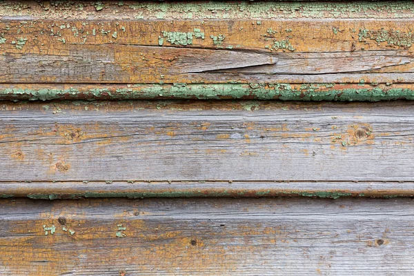 Old wooden painted and chipping paint. — Stock Photo, Image