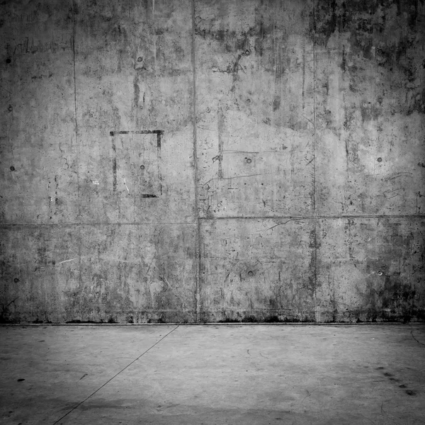 지저분한 콘크리트 벽과 바닥을 배경으로 — 스톡 사진