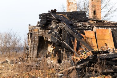Ruins and remains of a burned down house clipart
