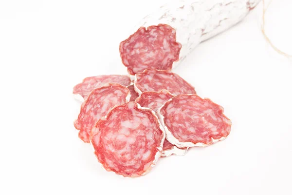Slices of salami isolated on a white — Stock Photo, Image