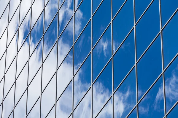 Textura de los edificios corporativos de gran altura de cristal azul — Foto de Stock