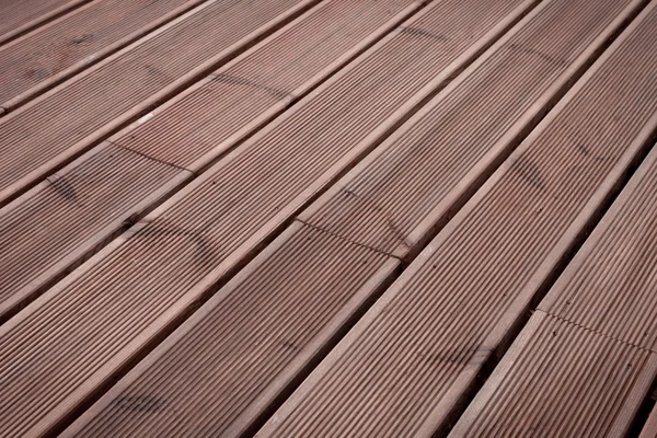 Natte houten terras vloer achtergrond — Stockfoto