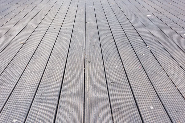 Leeftijd grijze houten terras vloer achtergrond — Stockfoto