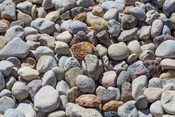 Stranden sten bakgrund — Stockfoto