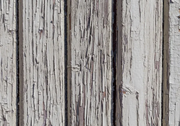 Деревянная стена с белой краской — стоковое фото