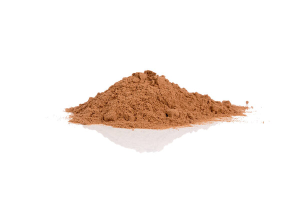 Heap of cocoa powder isolated on a white background