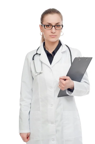 Doctora con una pizarra blanca sobre fondo blanco . — Foto de Stock