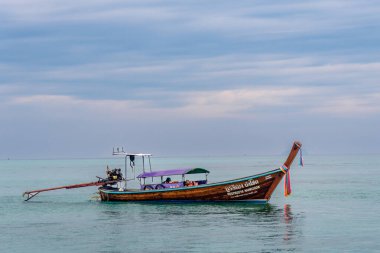 Thai longboats in the seas off the coast of Ko Phi Phi