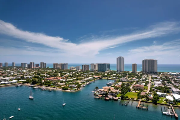 aerial view of singer island, palm beach county, florida, looking to the atlantic ocean, with luxurious condo towers lining the beach, july 2021