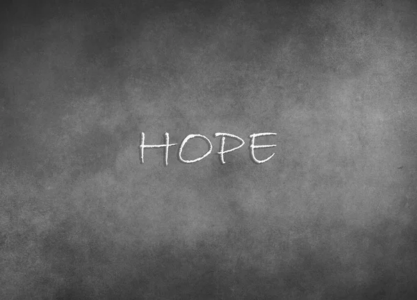 Het Woord Hoop Een Grijze Achtergrond Het Concept Van Hoop — Stockfoto