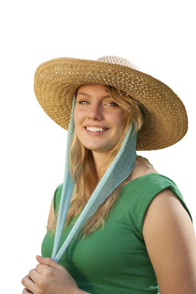 Молода жінка в зеленому сорочки і солом'яний капелюшок Ліцензійні Стокові Зображення