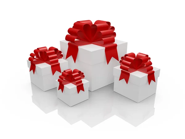 Cajas de regalo blancas con cinta roja — Foto de Stock