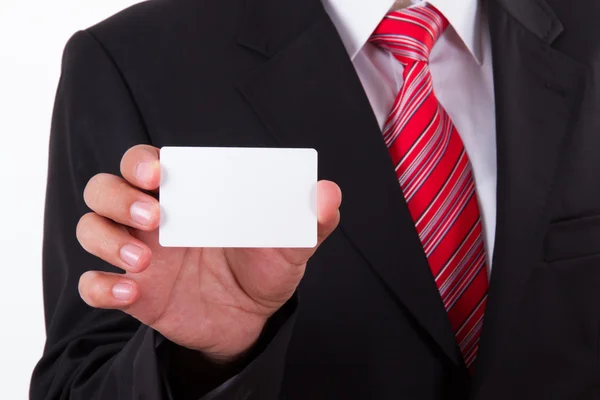 Empresário mostra cartão de visita em branco — Fotografia de Stock