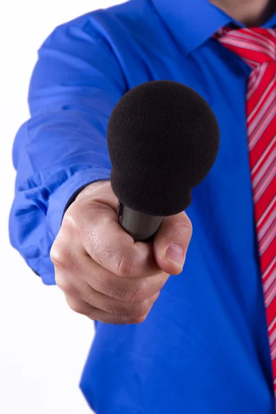 Zakenman bereiken microfoon voor interview — Stockfoto