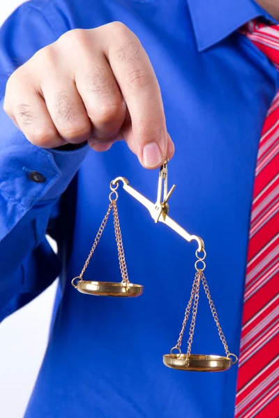 Businessman Shows Scales Stock Photo