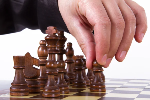 Hand Moving Pawn One Step Forward — Stock Photo, Image