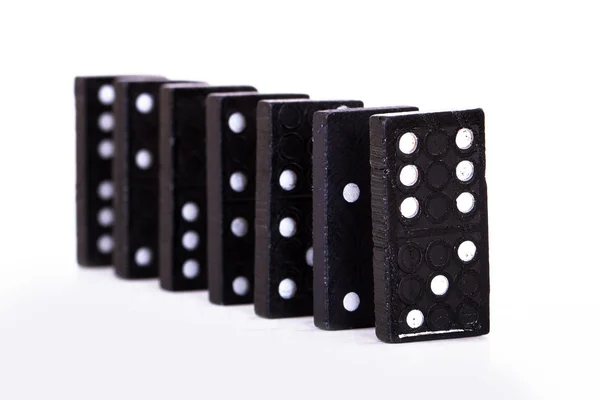 Fila di domino nero — Foto Stock