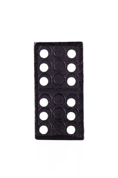 Tek siyah domino — Stok fotoğraf