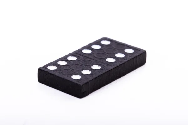 Pojedyncze czarne domino — Zdjęcie stockowe