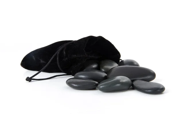 Piedras de masaje negro con estuche — Foto de Stock