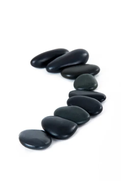 Piedras de masaje en una fila — Foto de Stock