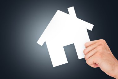 Hand Holding Real Estate Cardboard clipart