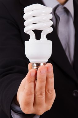 iş kadını gösteren ampul