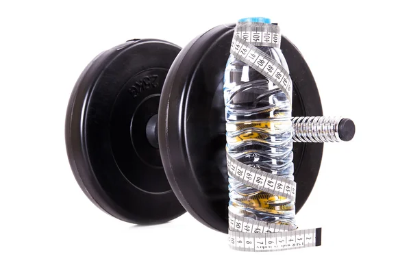 Dumbbell ve su ile şerit metre — Stok fotoğraf