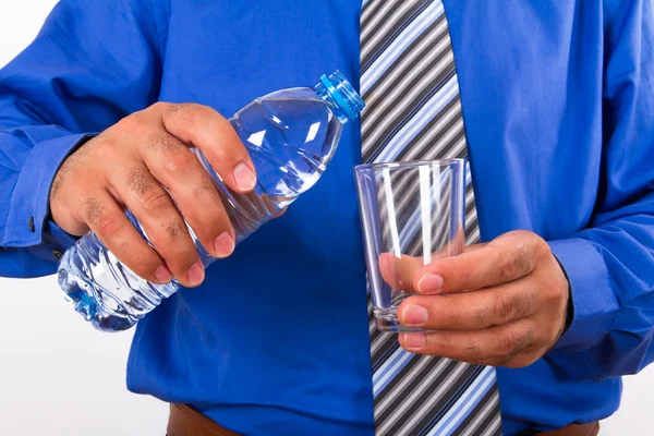 Wasserflasche und Glas mit Geschäftsmann — Stockfoto