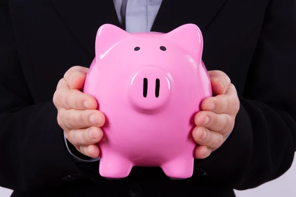 Business Woman Holding Piggy Bank — Stock Photo, Image