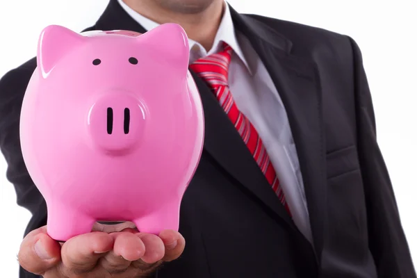 Zakenman en piggy bank — Stockfoto