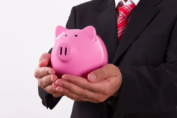 Businessman Holds Piggy Bank — Stock Photo, Image