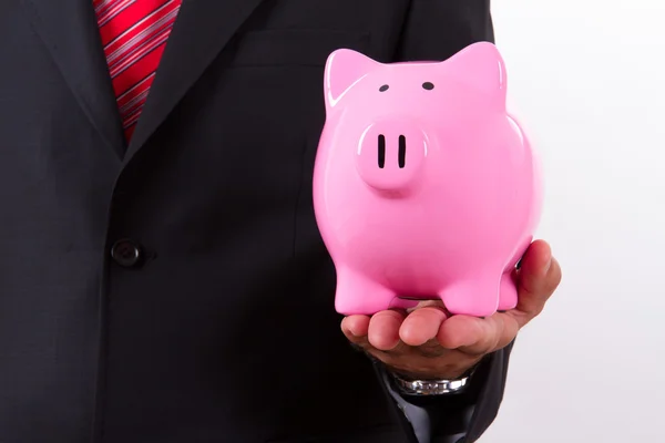 Man bedrijf piggy bank — Stockfoto