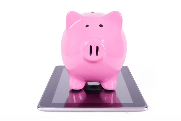 Piggy Bank on Tablet — Stock Photo, Image