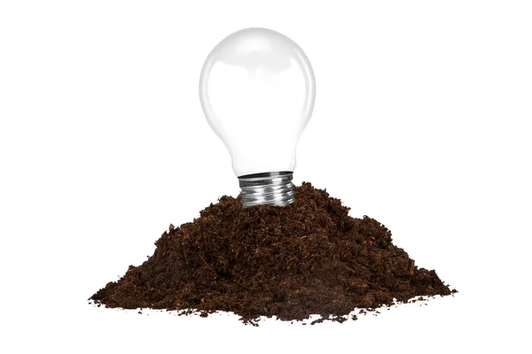 Pile of Soil and Light Bulb — Stock Photo, Image