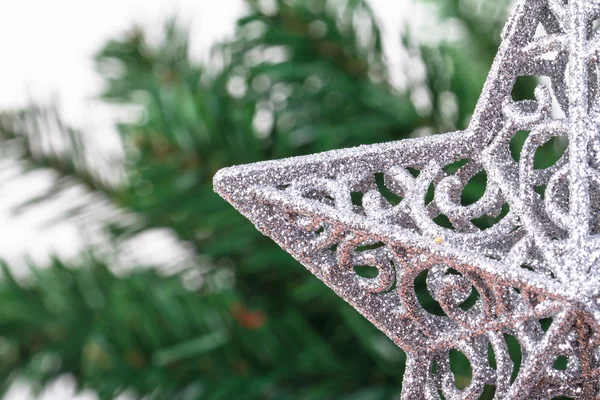 Árvore de Natal com ornamento de estrela — Fotografia de Stock