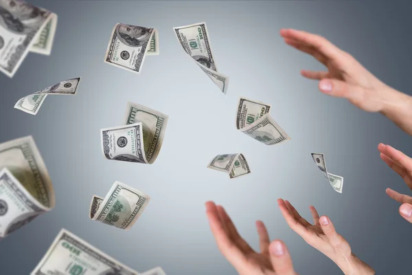 Dollar Banknotes Falling on Young Male Hands — Stock Photo, Image