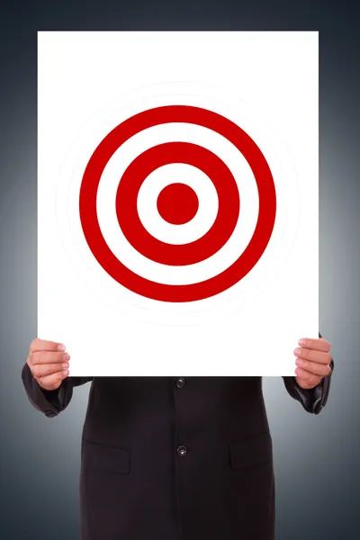 Businessman Hand Holding Poster with Target — Stock Photo, Image