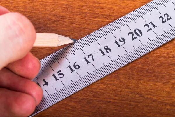 Hand Holding Pencil and Ruler — Stock Photo, Image