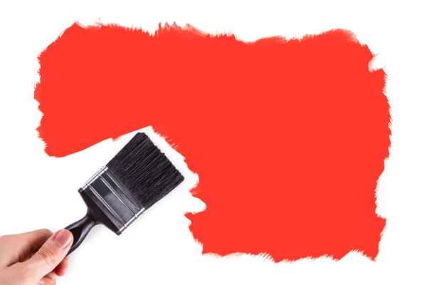 Hand Painting White Wall with Orange — Stock Photo, Image