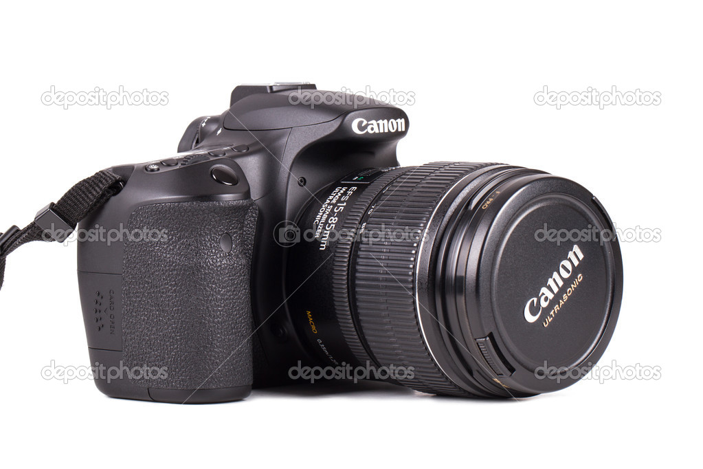 Istanbul turkey may 19 2014 side view of canon 60d camera and 15 85mm zoom lens isolated on white background photo by niglaynike Istanbul turkey may 19 2014 side view of canon 60d camera and 15 85mm zoom lens isolated on white background photo by niglaynike