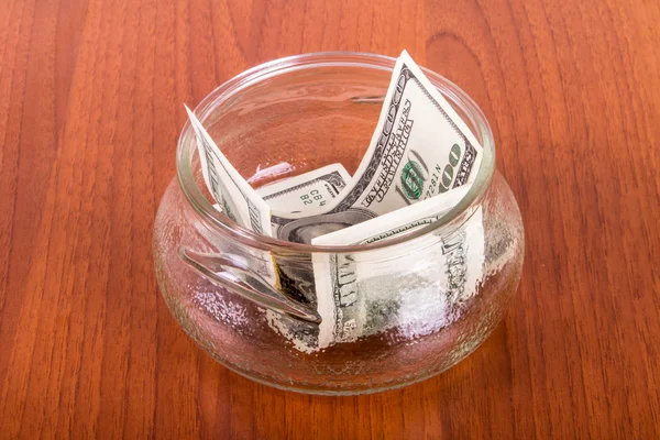 Dollar Banknotes in Glass Bowl — Stock Photo, Image