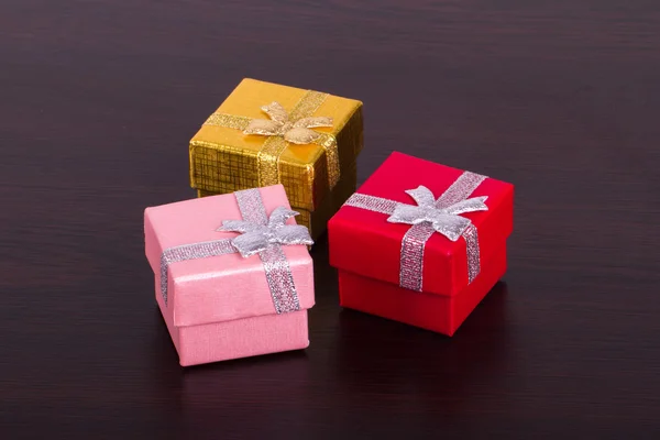 Tres cajas de regalo en madera — Foto de Stock