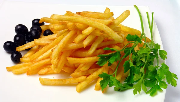 Жареный картофель, овощи — стоковое фото